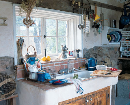 
Not unlike her grandmother’s rustic kitchen in Steep Ravine, Dyanna’s is filled with all the essential tools of the trade, an earthy palace of utility in the middle of the cabin.
